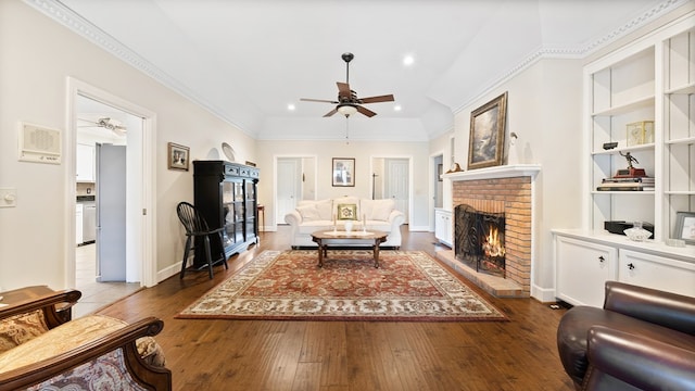 6359 Cape Cod Dr, Columbus, GA 31904 - living area with a fireplace, a ceiling fan, hardwood / wood-style flooring, recessed lighting, and ornamental molding