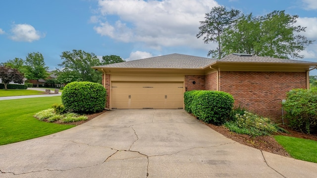 6359 Cape Cod Dr, Columbus, GA 31904 - view of front of property featuring brick siding, driveway, a front yard, and a garage