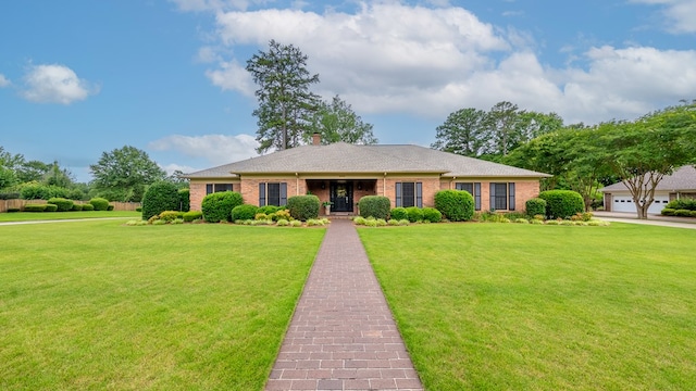 6359 Cape Cod Dr, Columbus, GA 31904 - single story home featuring a front yard, brick siding, and a chimney