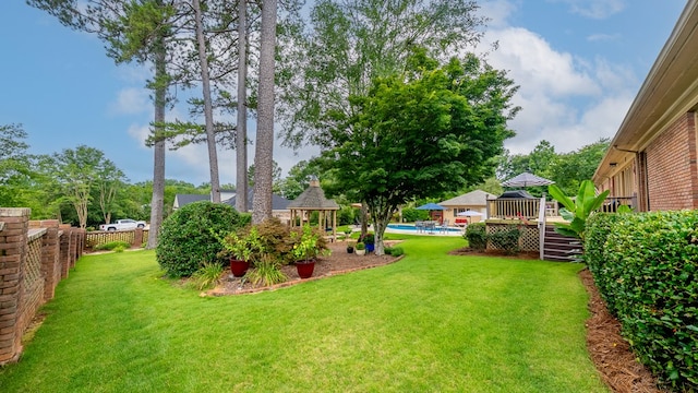 6359 Cape Cod Dr, Columbus, GA 31904 - fenced yard with a gazebo and a wooden deck