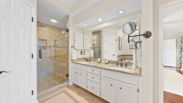 6359 Cape Cod Dr, Columbus, GA 31904 - bathroom featuring a shower stall, double vanity, and recessed lighting