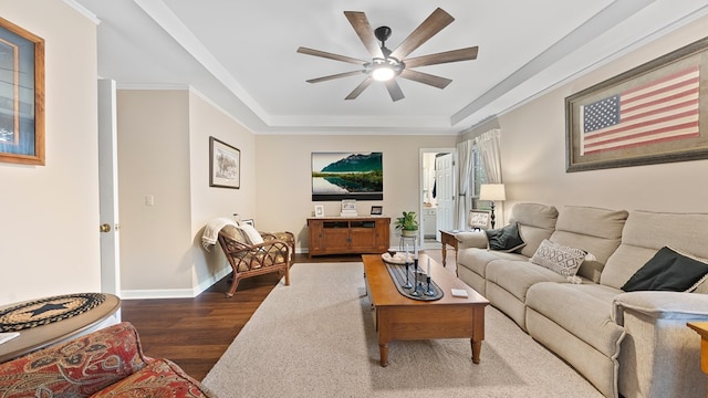 6359 Cape Cod Dr, Columbus, GA 31904 - living area featuring a tray ceiling, dark wood-style flooring, and ceiling fan