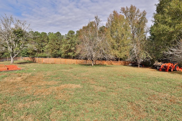 view of yard with a rural view