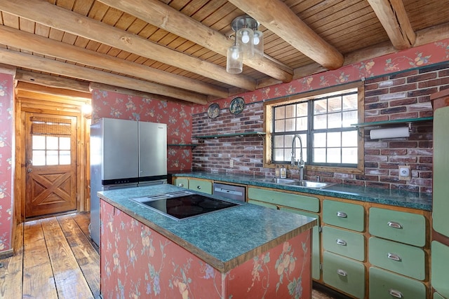 kitchen with sink, a kitchen island, beamed ceiling, light hardwood / wood-style floors, and wood ceiling