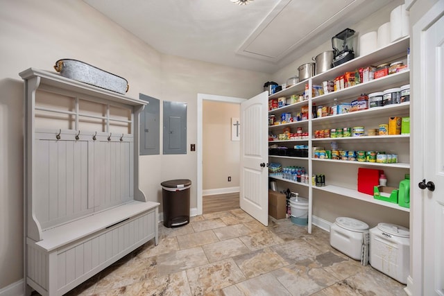 mudroom featuring electric panel