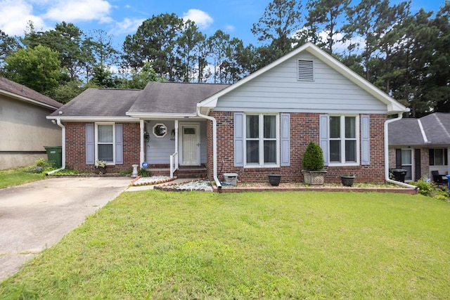 4608 Mayo Dr, Columbus, GA 31909 - view of front of home with brick siding and a front lawn