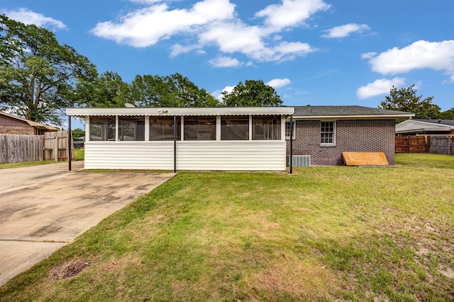 2245 Gennings Ct, Columbus, GA 31907 - back of house featuring a sunroom and brick siding