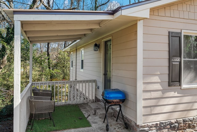 exterior space featuring a grill