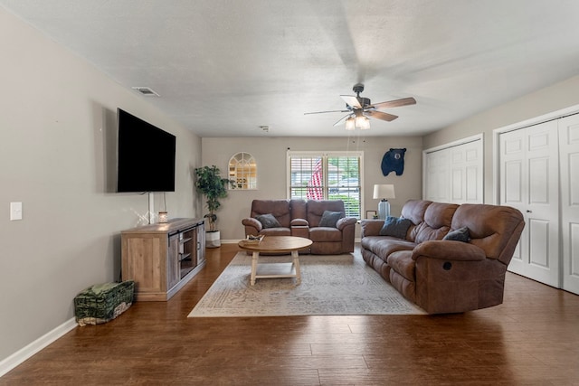 1903 Ashley Dr, Phenix City, AL 36867 - living area featuring ceiling fan, wood finished floors, and baseboards