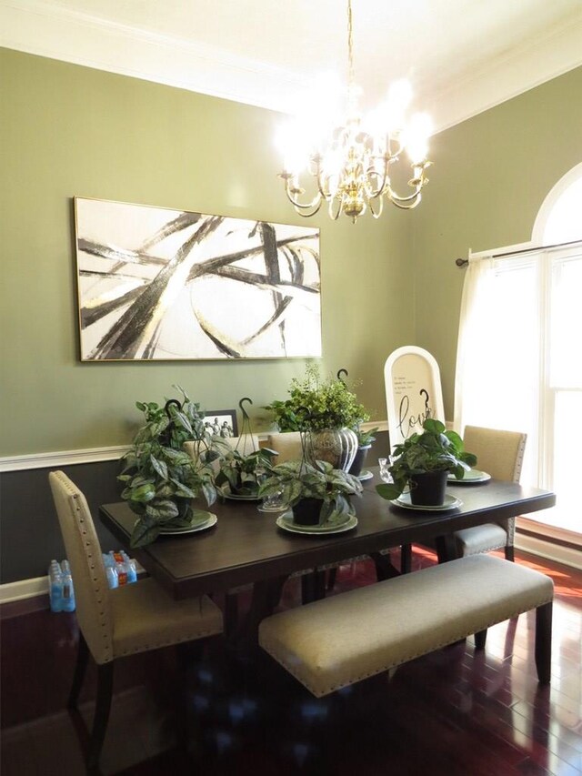 kitchen featuring stainless steel appliances, decorative backsplash, white cabinetry, and crown molding