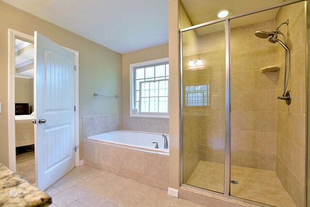 72W Teddy Bear Ln, Waverly Hall, GA 31831 - ensuite bathroom with a stall shower, a garden tub, and tile patterned flooring