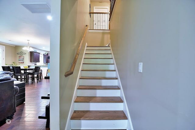 72W Teddy Bear Ln, Waverly Hall, GA 31831 - stairs featuring a chandelier and wood finished floors