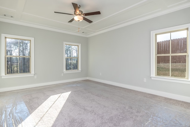 carpeted empty room with ceiling fan and ornamental molding