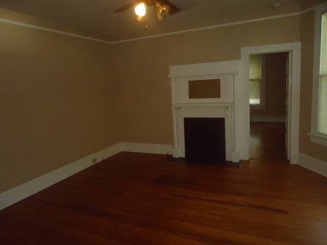 unfurnished living room with crown molding, ceiling fan, and hardwood / wood-style flooring