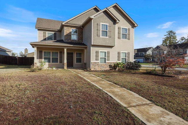 view of front of property featuring a front lawn