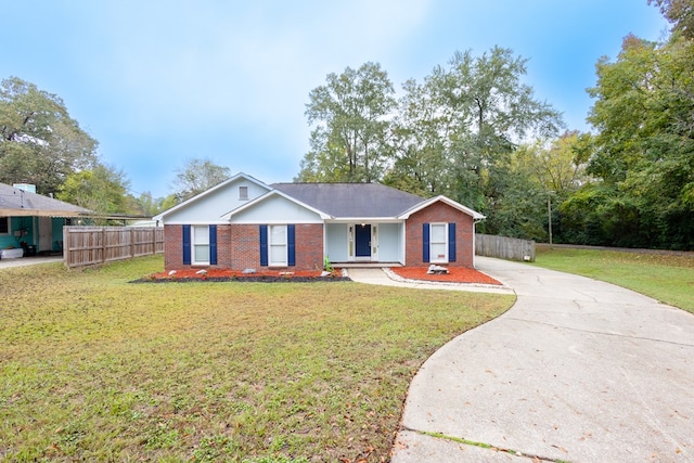 ranch-style home with a front lawn