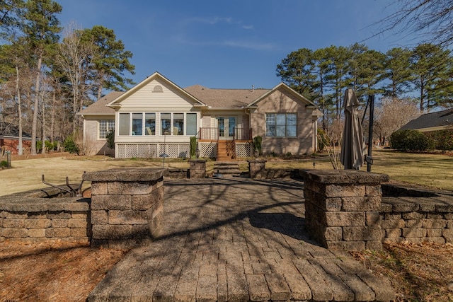 view of front of home featuring stairway and french doors