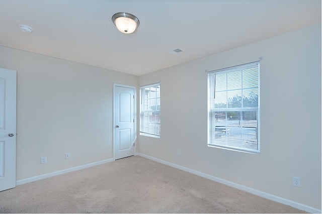 view of carpeted spare room