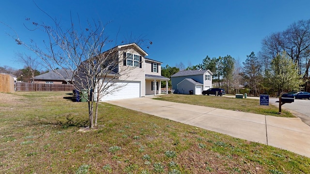 view of front facade featuring driveway, an attached garage, a front lawn, and fence