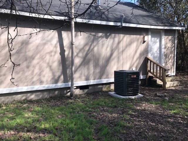 view of property exterior featuring central air condition unit