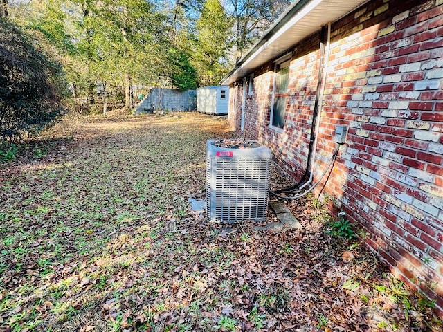 view of yard featuring central air condition unit