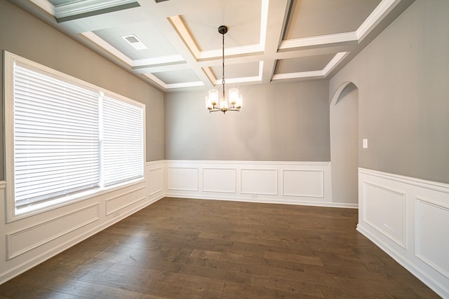 empty room with arched walkways, dark wood-style flooring, visible vents, a chandelier, and coffered ceiling