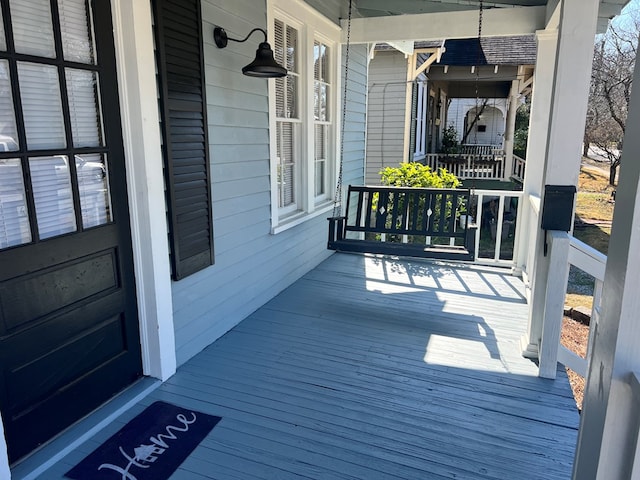 wooden deck featuring a porch