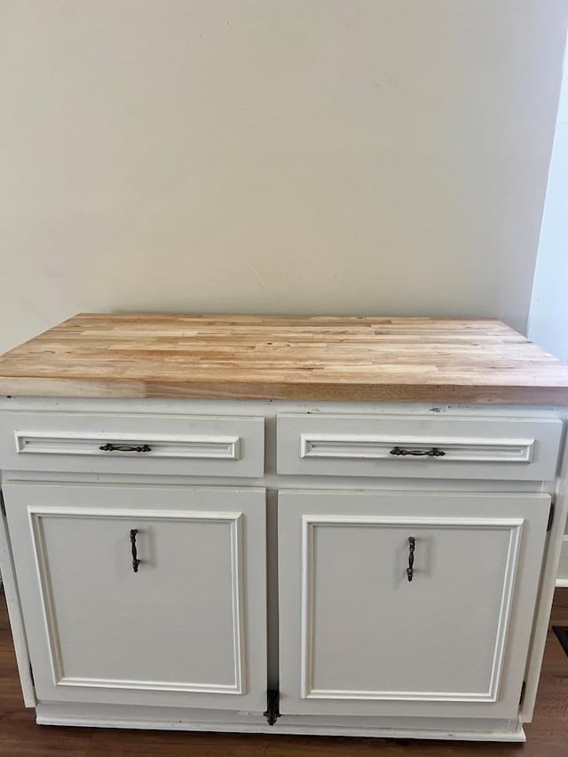 interior details featuring hardwood / wood-style flooring