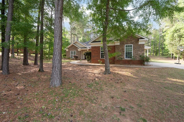 view of front of house featuring stone siding