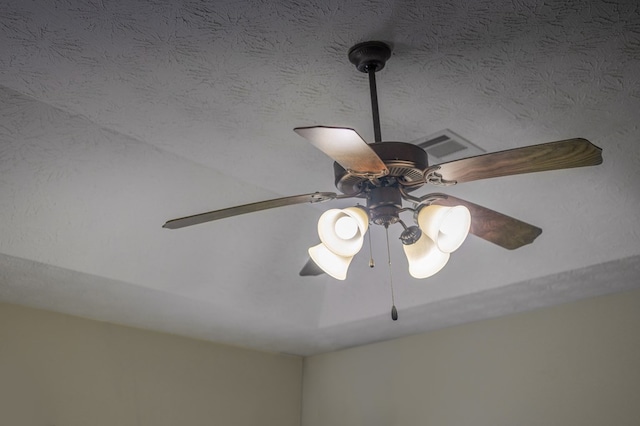 interior details with visible vents and ceiling fan