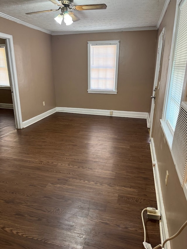 2109 12th Ave, Columbus, GA 31901 - empty room featuring dark wood-type flooring, a ceiling fan, a textured ceiling, and ornamental molding