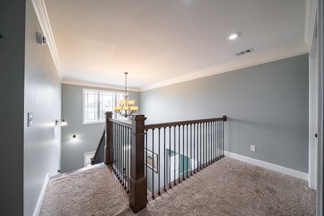 9597 Yarbrough Rd, Midland, GA 31820 - stairway featuring carpet floors, ornamental molding, a chandelier, and baseboards
