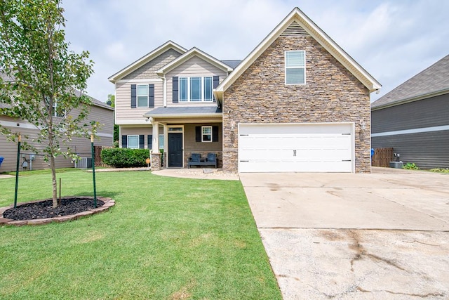 9597 Yarbrough Rd, Midland, GA 31820 - craftsman house featuring stone siding, a garage, concrete driveway, a front lawn, and cooling unit