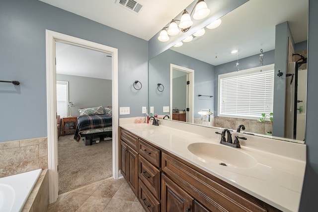 9597 Yarbrough Rd, Midland, GA 31820 - full bathroom with double vanity, a bath, and ensuite bathroom