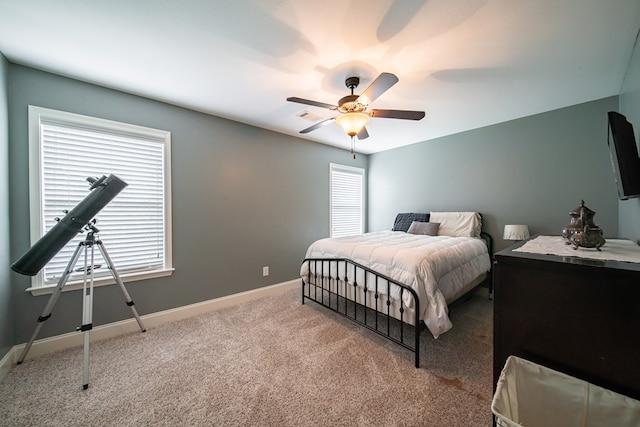 9597 Yarbrough Rd, Midland, GA 31820 - carpeted bedroom featuring baseboards and a ceiling fan