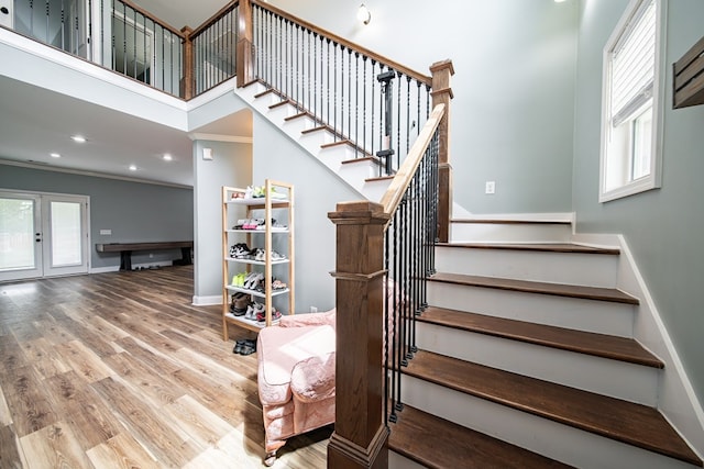 9597 Yarbrough Rd, Midland, GA 31820 - staircase with crown molding, wood finished floors, baseboards, and recessed lighting