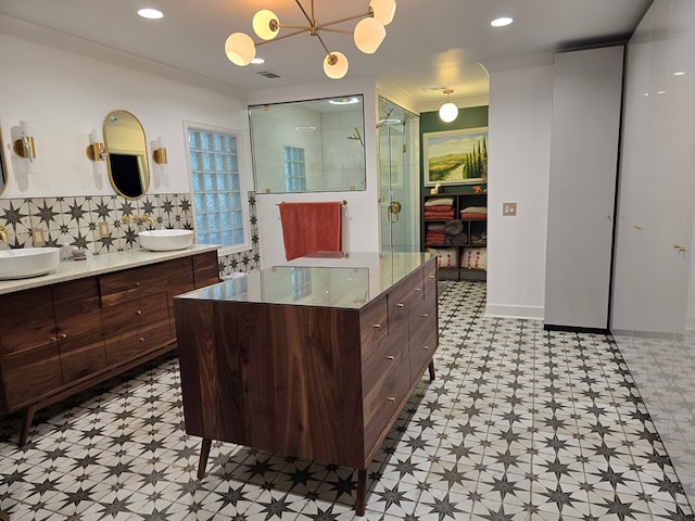 2914 Sue Mack Dr, Columbus, GA 31906 - full bathroom featuring tile patterned floors, double vanity, a shower stall, decorative backsplash, and ornamental molding