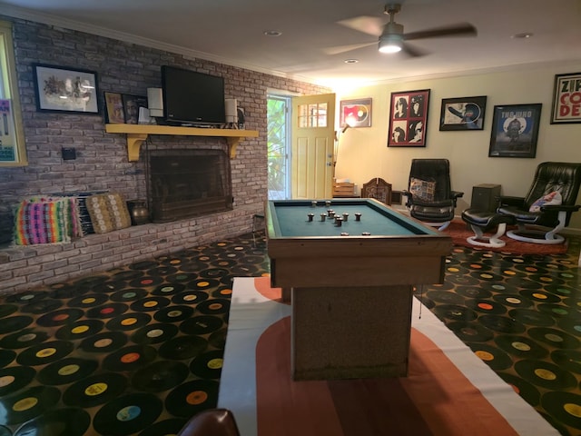 2914 Sue Mack Dr, Columbus, GA 31906 - playroom with ceiling fan, a brick fireplace, crown molding, brick wall, and pool table