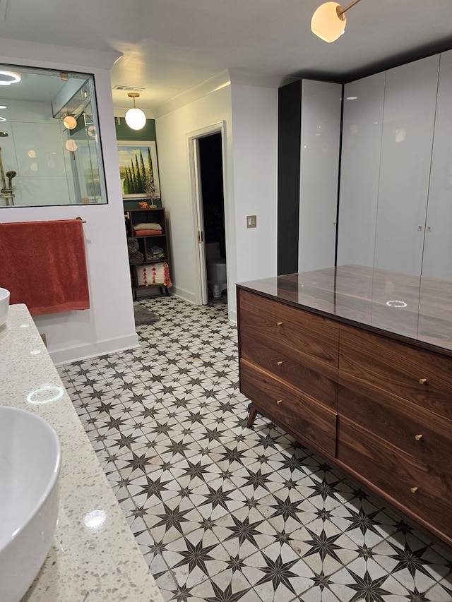 2914 Sue Mack Dr, Columbus, GA 31906 - bathroom with tile patterned floors, vanity, and walk in shower