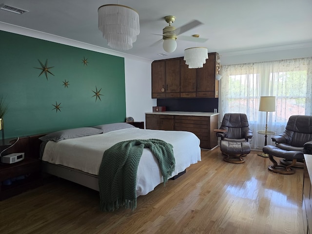 2914 Sue Mack Dr, Columbus, GA 31906 - bedroom featuring ornamental molding and wood finished floors