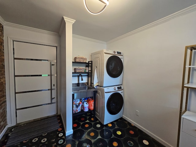 2914 Sue Mack Dr, Columbus, GA 31906 - washroom featuring stacked washing machine and dryer, crown molding, brick wall, and tile patterned floors