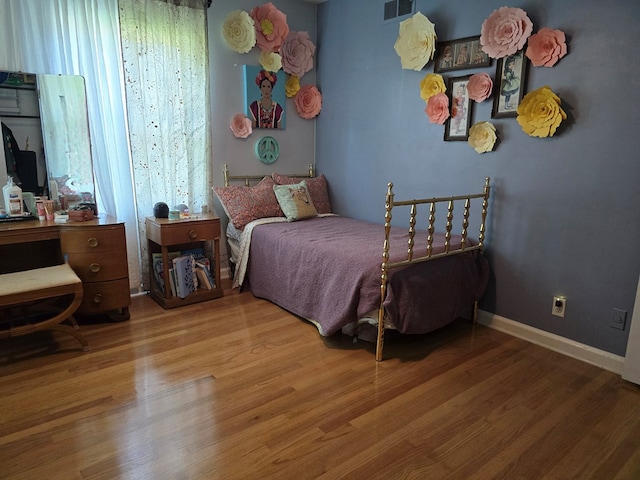 2914 Sue Mack Dr, Columbus, GA 31906 - bedroom featuring wood finished floors and baseboards