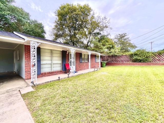 exterior space with a front yard