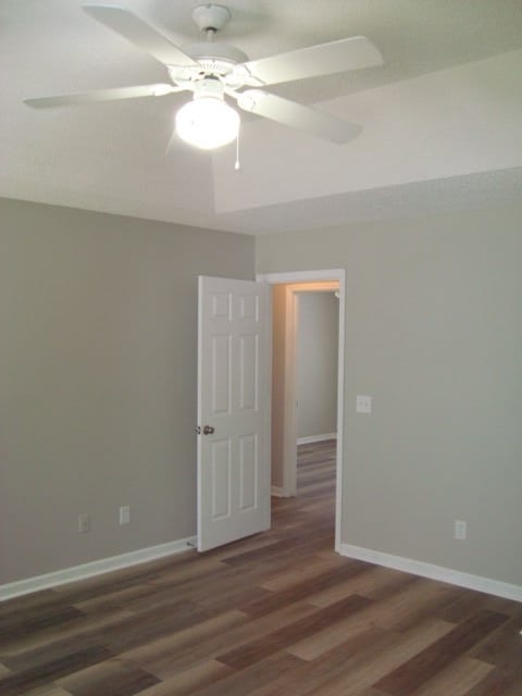 4118 Terrace Pointe Dr, Columbus, GA 31909 - spare room with wood finished floors and a ceiling fan