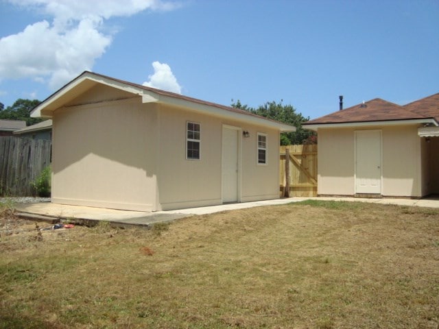 4118 Terrace Pointe Dr, Columbus, GA 31909 - rear view of house featuring an outbuilding