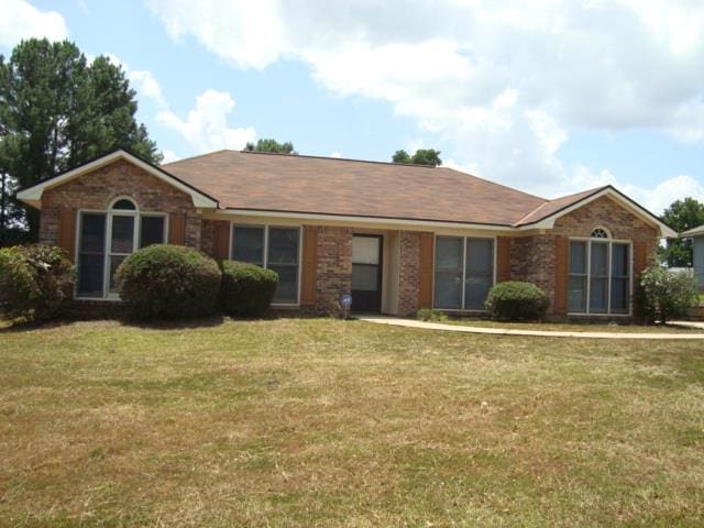 4118 Terrace Pointe Dr, Columbus, GA 31909 - ranch-style house featuring a front yard and brick siding