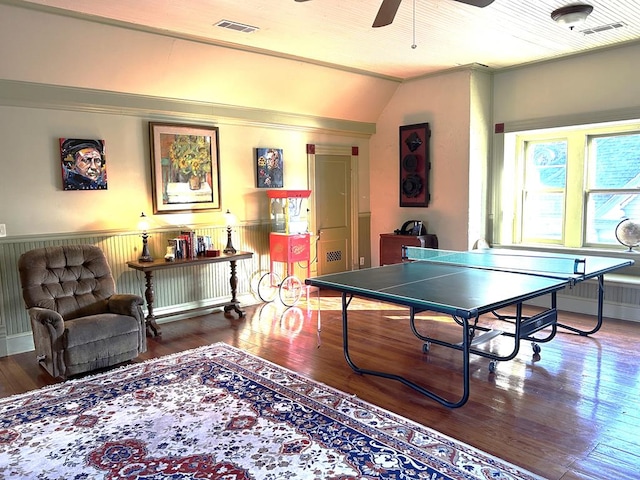 game room featuring ceiling fan, wood-type flooring, and lofted ceiling