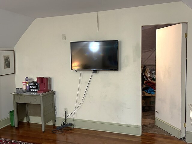 playroom featuring hardwood / wood-style floors, wooden walls, vaulted ceiling, ceiling fan, and pool table