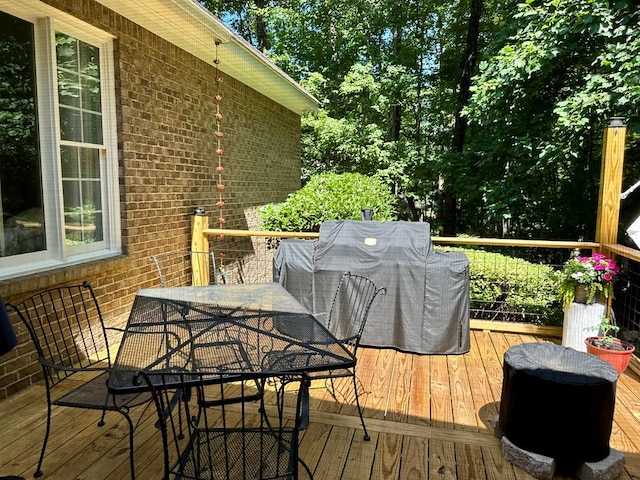 105 Lake View Dr, Hamilton, GA 31811 - deck featuring outdoor dining space and grilling area