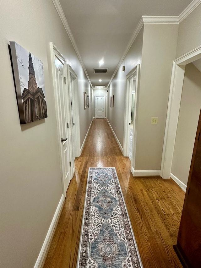 105 Lake View Dr, Hamilton, GA 31811 - hallway featuring wood finished floors and crown molding